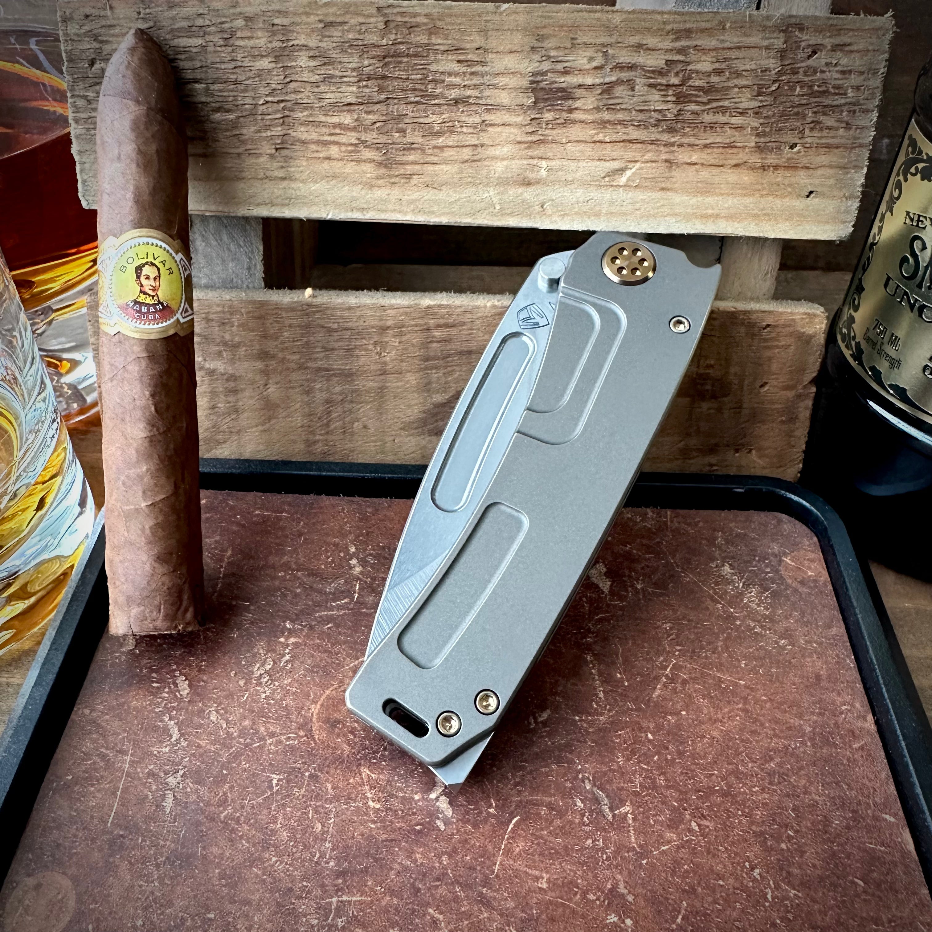 Medford Knife and Tool Marauder-H with S45vn Drop Point Blade, Old School Tumbled Rose Gold Titanium Handles, Rose Gold Hardware, and Standard Breaker - Anodized Pivot